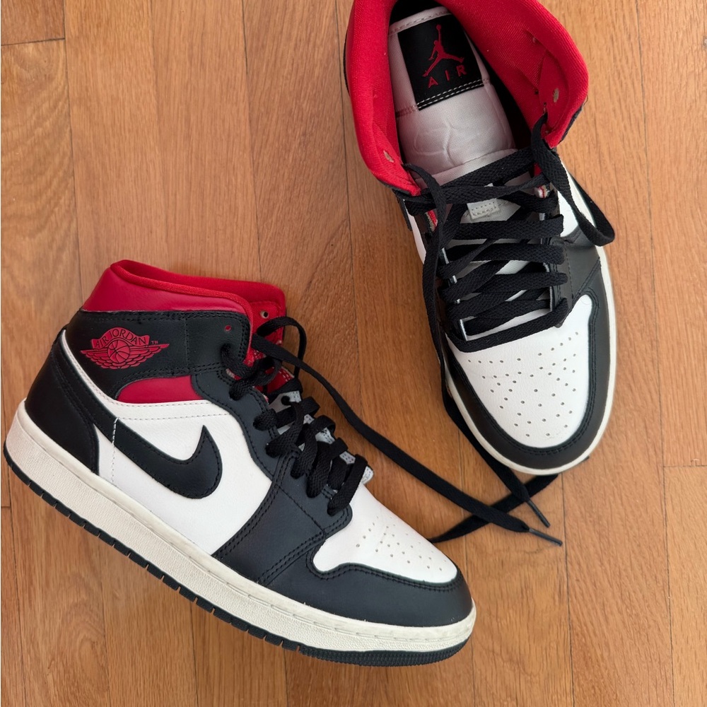 Black and White Jordans with Red Accents